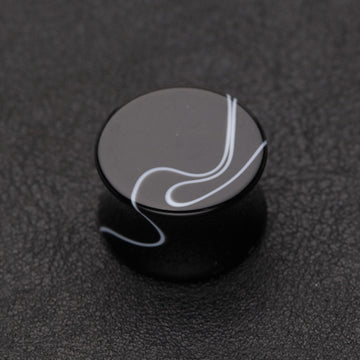 Detail View 1 of A Pair of Marble Swirl Acrylic Double Flared Ear Gauge Plug-Black
